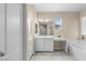 Well-lit bathroom boasts a tub, vanity, and attractive flooring, creating a spa-like atmosphere at 9053 Boston Springs Ave, Las Vegas, NV 89149