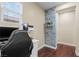 Bedroom with hardwood floors set up as an office with decorative nook at 9053 Boston Springs Ave, Las Vegas, NV 89149