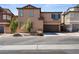 Charming two-story home with a two-car garage and well-maintained landscaping at 9053 Boston Springs Ave, Las Vegas, NV 89149