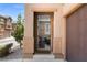Inviting entry way featuring a view into the home, a contemporary door and an attached two-car garage at 9053 Boston Springs Ave, Las Vegas, NV 89149