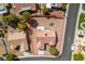 Aerial view of property lines and backyard, set in a landscape of desert and neighborhood homes at 9105 Marble Dr, Las Vegas, NV 89134