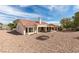 Backyard featuring desert landscaping, a covered patio, and ample space for outdoor activities at 9105 Marble Dr, Las Vegas, NV 89134