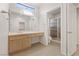 Bathroom featuring a vanity area, walk-in shower, and walk-in closet at 9105 Marble Dr, Las Vegas, NV 89134