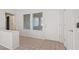 Bright entryway features a white front door, tile floors, and ample natural light at 9105 Marble Dr, Las Vegas, NV 89134