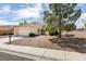 Charming one-story home with a well-maintained yard, two-car garage, and tile roof in a quiet neighborhood at 9105 Marble Dr, Las Vegas, NV 89134