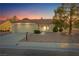 Inviting one-story home with a two-car garage, covered entryway, and beautiful desert landscaping at 9105 Marble Dr, Las Vegas, NV 89134