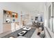 Bright living space with built-in shelving, seamlessly connected to the dining area and open kitchen at 9105 Marble Dr, Las Vegas, NV 89134