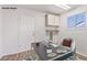 Bright office with a window view, neutral colors, and functional workspace at 9105 Marble Dr, Las Vegas, NV 89134