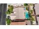 Aerial shot showcases the backyard pool with garden and tiled roof at 9205 Desert Village Ave, Las Vegas, NV 89147