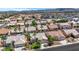 Spacious neighborhood featuring single-Gathering homes with desert landscaping and community amenities at 9205 Desert Village Ave, Las Vegas, NV 89147