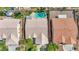 Aerial view of the home with a pool and nice surroundings at 9205 Desert Village Ave, Las Vegas, NV 89147