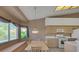 Inviting kitchen with a window bench and views, complemented by modern appliances and cabinetry at 9205 Desert Village Ave, Las Vegas, NV 89147
