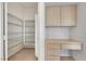 Well-organized office space with built-in shelves and a desk, plus a convenient pantry at 9205 Desert Village Ave, Las Vegas, NV 89147