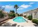 A private backyard pool surrounded by lush landscaping offers a serene escape at 9205 Desert Village Ave, Las Vegas, NV 89147