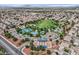 Aerial view showcasing the community park and recreation areas with lush green spaces at 927 Clear Diamond Ave, Las Vegas, NV 89123