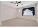 Bedroom with carpet flooring, neutral walls, and a ceiling fan at 927 Clear Diamond Ave, Las Vegas, NV 89123