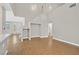 Bright living room with hardwood floors, high ceilings, and a view of the entry at 927 Clear Diamond Ave, Las Vegas, NV 89123