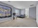 Upstairs bedroom with ample space, complemented by natural light and a comfortable atmosphere at 9840 Chief Sky St, Las Vegas, NV 89178