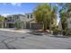 Charming two-story home featuring a well-maintained front yard, dual-car garage and cozy curb appeal at 9840 Chief Sky St, Las Vegas, NV 89178