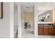 Well-appointed bathroom with a glass-enclosed shower, contemporary fixtures, and stylish decor at 10748 Steel Ridge Ct, Las Vegas, NV 89135
