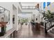 Grand entryway featuring soaring ceilings and contemporary design with sightlines to the living room at 10748 Steel Ridge Ct, Las Vegas, NV 89135