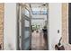 Welcoming foyer showcasing an open floor plan, high ceilings, and a seamless transition to the living area at 10748 Steel Ridge Ct, Las Vegas, NV 89135