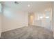 Large bedroom features neutral carpet and walls, with lots of natural light at 10974 Cheshire Woods Ave, Las Vegas, NV 89166