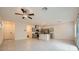 Spacious kitchen featuring stainless steel appliances, an island with granite countertops, and modern cabinetry at 10974 Cheshire Woods Ave, Las Vegas, NV 89166