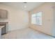 Bright corner breakfast nook area featuring tile floor and granite countertops at 10974 Cheshire Woods Ave, Las Vegas, NV 89166