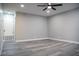 Spacious bedroom with recessed lighting, a ceiling fan, and modern gray wood flooring at 1440 Vegas Valley Dr # 3, Las Vegas, NV 89169