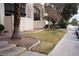 View of the exterior and side yard of the property and public sidewalk at 1440 Vegas Valley Dr # 3, Las Vegas, NV 89169