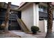 Exterior view of a townhome unit featuring stairs to the second floor at 1440 Vegas Valley Dr # 3, Las Vegas, NV 89169