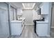 This kitchen has white cabinets, a black faucet, modern appliances, and plenty of counter space at 1440 Vegas Valley Dr # 3, Las Vegas, NV 89169