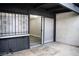 Private outdoor patio with neutral tile flooring and a security door to the interior at 1440 Vegas Valley Dr # 3, Las Vegas, NV 89169