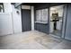 Private outdoor patio with neutral tile flooring and an adjacent updated kitchen at 1440 Vegas Valley Dr # 3, Las Vegas, NV 89169