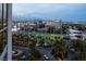 Beautiful full view of a golf course featuring nighttime play with skyline views in the background at 145 E Harmon Ave # 1120, Las Vegas, NV 89109