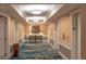 Well-lit hallway featuring elegant decor and access to multiple elevators at 145 E Harmon Ave # 1120, Las Vegas, NV 89109