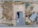 Straight down aerial view of a modern home showcasing its roof, yard, and position in the neighborhood at 1500 E Laguna St, Pahrump, NV 89048