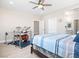 Bright bedroom featuring a ceiling fan, a comfortable bed and a drum set at 1500 E Laguna St, Pahrump, NV 89048