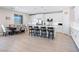 Spacious open kitchen with a large island, a full-sized dining table and stainless steel appliances at 1500 E Laguna St, Pahrump, NV 89048