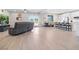 Spacious open-concept living area with stylish kitchen island, comfortable seating, and seamless flow throughout the home at 1500 E Laguna St, Pahrump, NV 89048