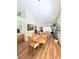 Comfortable dining room with hardwood flooring and natural lighting, perfect for Gathering meals at 1536 Brocado Ln, Las Vegas, NV 89117