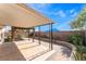 Scenic backyard patio with pergola-covered area, stone accents and lovely landscaped garden at 1740 Leaning Pine Way, Las Vegas, NV 89128