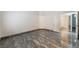 Spacious bedroom featuring stylish marble flooring and a convenient bathroom and closet entrance at 1740 Leaning Pine Way, Las Vegas, NV 89128