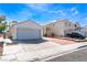 Charming home with a two-car garage, mature landscaping, and inviting curb appeal at 1740 Leaning Pine Way, Las Vegas, NV 89128