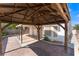 Inviting pergola with wooden beams and brick-paved patio area perfect for outdoor relaxation at 1740 Leaning Pine Way, Las Vegas, NV 89128