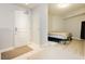 Bright bedroom with an open door and light-colored wood floors at 200 W Sahara Ave # 910, Las Vegas, NV 89102