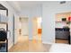 Bright bedroom with light-colored wood floors and a neutral color scheme with open doors to closets at 200 W Sahara Ave # 910, Las Vegas, NV 89102