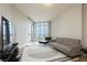 Contemporary living room featuring a comfortable sofa, large windows, and modern decor, creating an inviting space at 200 W Sahara Ave # 910, Las Vegas, NV 89102