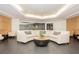 Common seating area with contemporary design, large sofa, and modern decor at 200 W Sahara Ave # 910, Las Vegas, NV 89102